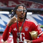 MUNICH, GERMANY - MAY 16: Michael Olise of FC Bayern Munich celebrates with the Bundesliga Player of the Season award after the Bundesliga match between FC Bayern München and 1. FC Köln at Allianz Arena on May 16, 2026 in Munich, Germany. (Photo by Alexander Hassenstein/Getty Images) Getty Images